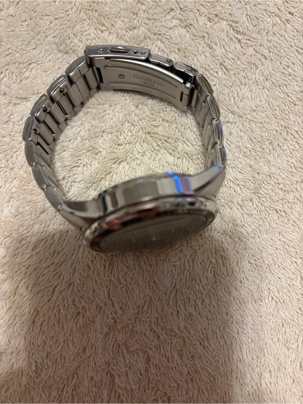 Casio Men's Black Dial Silver Stainless Steel Watch with Orange Accents